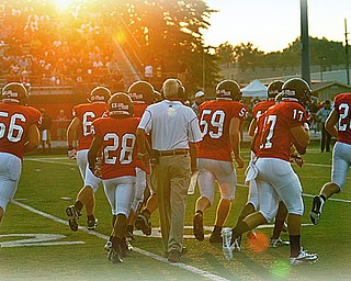 Austintown Fitch Coach Annarella - #56 Mike Koch, #28 - Tyreese Anderson, #59 - Matt Mullins, #17 Tyler Grover, #20 Jared McHenry with one of the starting plays