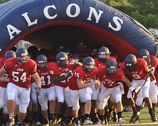 Austintown Fitch players coming out of the tunnel in front - #54 Billy Price, #41 Andrew James, #15 Matt Futkos, #17 Tyler Grover, #9 KJ Lawrence