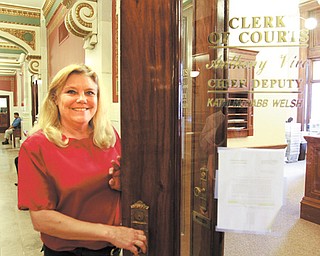 Kathy Petrella, a longtime worker in the county clerk of courts office, will retire before changes are made in the Ohio Public Employee Retirement System that would affect her health care.