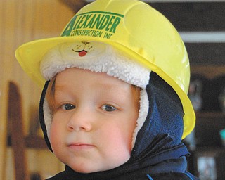 Peyton Shultz of New Middletown has some serious thoughts with his hard hat on. Maybe more construction workers should wear puppy-dog hats under their hard hats? Photo sent in by Betty Shultz of Youngstown, Peyton's grandma.