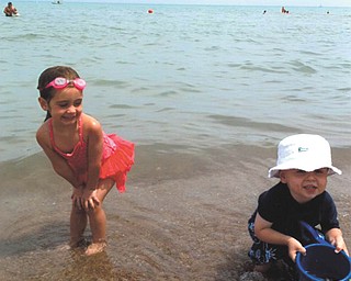 Cousins enjoy spending time together at the beach. At left is Alyssa Conklin, 4, daughter of Jeff and Celeste Adduci Conklin of Cleveland. With her is Jack Curchin, 2 1/2, son of Graham and Jennifer Conklin Curchin of Chicago. Proud grandparents are: Rob and Sue Conklin of Boardman; Rocco Adduci of Warren; Charlotte Adduci of Poland; and Alex and Cindy Curchin of Joplin, Mo.