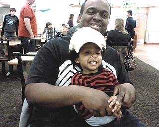 Here's Roy Jones III at age 2. He's the son of Roy II (shown here) and Candace Jones of Youngstown, who sent in the photo.