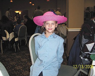 Deianira Johnson, 7, daughter of Angela and Tom Johnson, enjoys the party. Photo sent in by grandmother Carol Doll.