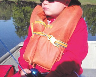 Nicholas Colbert wears his Indiana Jones hat on a fishing adventure at Salem Country Club. He's the son of Judi and Willi Colbert of Salem, who sent in this photo..