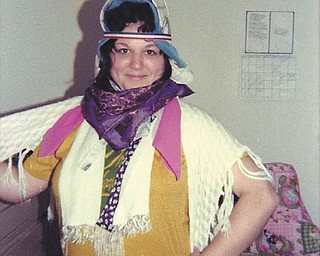 Sheree Upright submitted this photo, writing, "This photo is from 1976 of my college roommate, Cindy Harding. I asked her if she had any scarves I could wear to work, and this is what she did. We could not stop laughing."