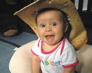Six-month-old Delaney Downie of Poland helped her mom get ready to go to a country music concert this summer. Photo submitted by Kricket Downie.