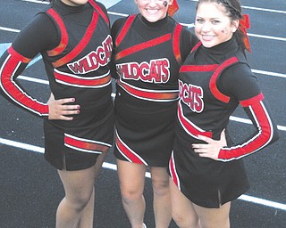 Struthers High School’s senior cheer captains Cheyenne Butler, Carly Nalepa and Taylor Winebold take time out for a photo