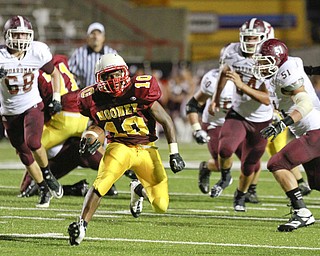 ROBERT K. YOSAY | THE VINDICATOR..Mooneys #10 Justis Ellis Moore scampers for a second quarter touchdown as #68 Bdm no name on roster - and #51 Justin Gardner look on ..Bdm @ Mooney - Stambaugh Stadium... - -30-..