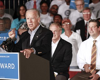 ROBERT K. YOSAY | THE VINDICATOR --..Joe Biden - Ted Strickland and Tim Ryan --Vice President Joe Biden made several stops in the area on Friday as he stopped in the UAW 1714 Mocha House and the Canfield Fair...(AP Photo/The Vindicator, Robert K. Yosay)