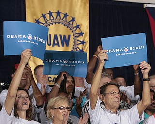 ROBERT K. YOSAY | THE VINDICATOR --..Hearty supporter - front row... Cathy McGowan of Hubbard - Mary Sue Lazac of Mineral Ridge and Mike Wisor of McDonald ---Vice President Joe Biden made several stops in the area on Friday as he stopped in the UAW 1714 Mocha House and the Canfield Fair...(AP Photo/The Vindicator, Robert K. Yosay)