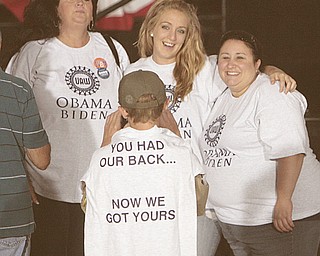 ROBERT K. YOSAY | THE VINDICATOR --..Vice President Joe Biden made several stops in the area on Friday as he stopped in the UAW 1714 Mocha House and the Canfield Fair..UAW supporters with fresh Tshirts in support of the Obama Administration ...(AP Photo/The Vindicator, Robert K. Yosay)