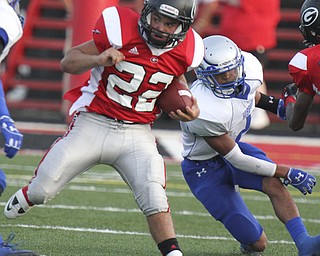 m D LEwis The Vindicator Girard's Jordan Graziano(22) scampers for 1rst half yardage at Girard Friday 8-31-12.Defending is Hubbard's Aries Shaw(2)