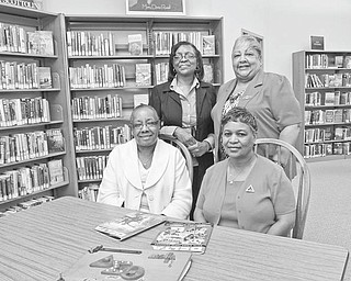 Among those planning the Delta Sigma Thetas' Tribute to Black Excellence event are, seated from left, Michele Dotson, chairwoman, and Gwen Montgomery, and standing from left, Charlotte Grant and Nikki Davis. Photo by: ROBERT K. YOSAY | THE VINDICATOR