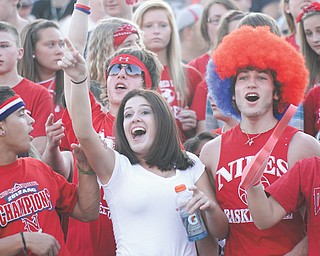 Niles fans cheer on the Red Dragons during their game against the Girard