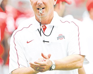 Ohio State coach Urban Meyer gestures before the Buckeyes’ game against Miami of Ohio on Saturday in Columbus.