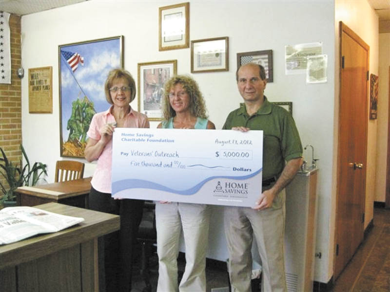 Veterans’ Outreach, a nonprofit charitable organization, was recently presented with a check for $5,000 from Home Savings Charitable Foundation for annual program support. From the left is Mary Kropinak, Home Savings Struthers Office presenting the check to Teri Ely, executive director, and Robert Julian, vice president/treasurer, both of Veterans’ Outreach. The organization has a primary mission of serving and honoring all veterans, including, shelter for homeless vets, rent, utility payments for terminated or near-termination accounts, auto repair, clothing, insurances, relocation, glasses and lay counseling. For information about Veterans’ Outreach call 888-283-8638 or visit www.veteransoutreach.com.