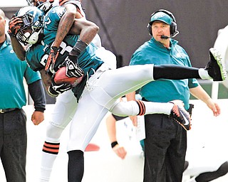 Philadelphia Eagles defensive back Dominique Rodgers-Cromartie (23) intercepts the ball intended for Cleveland Browns wide receiver Travis Benjamin (80) in the second quarter of their NFL season-opener Sunday at Cleveland Browns Stadium. The Eagles slipped by the Browns, 17-16.