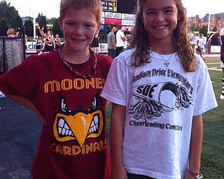 They may go to the same elementary school, but Guy Young and Mia Hammerton were cheering for opposite sides at the Boardman vs Mooney game!
