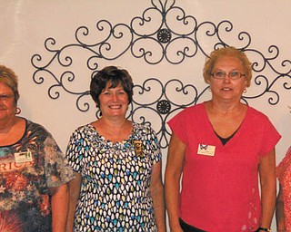 The Tri-Gold Chapter of the American Business Women’s Association met recently and installed the executive board for 2012-2013. From left are Kay Myers, secretary; Sharon Pasquale, treasurer; Dolly Sonnenlitter, president; and Elena Nigro, vice president. The chapter meets the second Wednesday of each month and is open to all working or retired women. Call 330-545-5957 for chapter information.