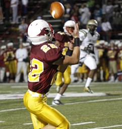 ROBERT K. YOSAY | THE VINDICATOR --..On his Way #22 CM Mark Handel pulls in a pass on the first play in the third quarter that he ran in for a touchdown - Akron St Vincent St Mary @ Cardinal Mooney at YSU Stadium..(AP Photo/The Vindicator, Robert K. Yosay)
