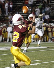 ROBERT  K.  YOSAY  | THE VINDICATOR --..On his Way  #22 CM Mark Handel  pulls in a pass on the first play in the third quarter that he ran in for a touchdown -  Akron St Vincent St Mary @ Cardinal Mooney  at YSU Stadium..(AP Photo/The Vindicator, Robert K. Yosay)