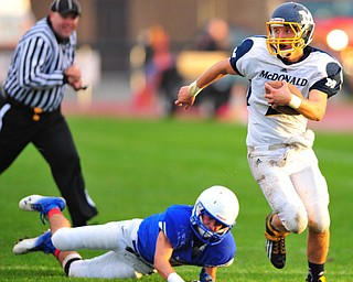 Mcdonald quarterback #2 Christian Rusinowski runs after the missed tackle of defensive back Danny Rosati #5 of Western Reserve on a 4th down an 1. McDonald was successful on the conversion.