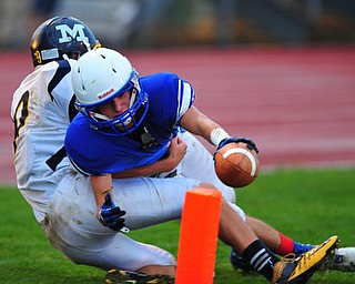 Western Reserve receiver #5 Danny Rosati reaches for the pylon of the end zone after being forced out for the 1 yard line by McDonald defensive back #9 Jake Rockard.