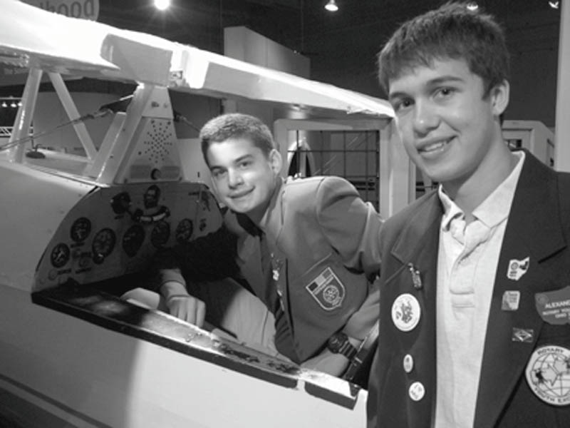 Preparing to take flight are Rotary Club of Youngstown’s inbound and outbound exchange students, who are examining the airplane exhibit at the OH WOW Children’s Museum in downtown Youngstown. On the left is Gauthier Gaillard, 16, a student who arrived in the United States on Aug. 28 from Les Herbiers, France. He is attending Ursuline High Schooland plans to study architecture after he graduates. At right is Alex Chiu, an exchange student to Stuttgart, Germany from Rotary District 1830. He graduated this year from Canfield High School and plans to pursue studies in language and international business. He also is a third-generation Rotarian. His father, Kevin Chiu, and grandfather, Dr. Y.T. Chiu, are members of Rotary Club of Youngstown.