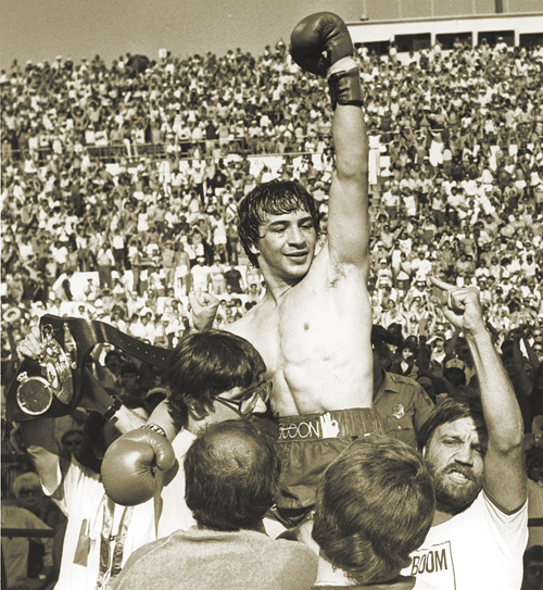 Mark Kriegel’s biography about Ray “Boom Boom” Mancini, shown here celebrating a victory over Ernesto Espana at Warren’s Mollenkopf Stadium in 1982, will be released nationwide today.