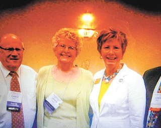 Youngstown Connection entertains Kiwanis in Boardman
The Ohio District of Kiwanis International held the 95th annual statewide meeting at Holiday Inn in Boardman. Chuck Whitman, left, is past lieutenant governor of Division 21 and past president of the Youngstown Club; Joyce Pogany is past lieutenant governor of Division 21 and past president of the Austintown Club; Lee Ann Wallace is incoming First Lady of the Ohio District; and Craig Wallace is incoming governor. Alan Penn of the Median Club was among more than 300 Kiwanians and guests attending. They toured Butler Institute of American Art, the D.D. Davis Center in Mill Creek Park and a drive through Federal Street and Youngstown State University. Governor Bill Snellgrove presided at the event at which the Youngstown Connection entertained.