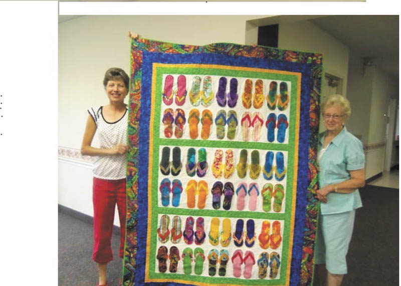 Kelly DePalma, left, and Cynthia Briggs, members of IQ Quilt Club, show off a novelty quilt featuring a design with flip-flops that will be a door prize at the 33rd annual quilt show planned from 9 a.m. to 5 p.m. Sept. 29 at New Vernon Grange, 239 Sheakleyville Road, Clarks Mills, Pa. Donation is $2. The event will include quilting demonstrations and fabric dying, a country store with quilt-related items and four fabric and sewing machine vendors. DePalma’s fabric quilt creations will be showcased. Grange members will serve lunch. Quilts may be entered in the show by taking them to the grange by 2 p.m. Friday Sept. 28. For information call 724-376-2124 or 814-425-3375.