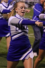 IMG 3435:Senior cheerleader Samantha Mock of Hubbard cheers during Friday nights football matchup against Struthers High School at Hubbard High School. ÊDustin Livesay Ê| ÊThe Vindicator Ê9/21/12 ÊHubbard, Ohio