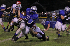 IMG 3544: LJ Scott (3) of Hubbard sheds the tackle of a Struthers defender duringÊFriday nights matchup at Hubbard High School. ÊDustin Livesay Ê| ÊThe Vindicator Ê9/21/12 ÊHubbard, Ohio