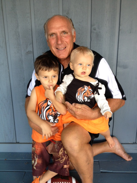 Howland coach dick angle and his two best fans  grandchildren Jake and Payton Angle