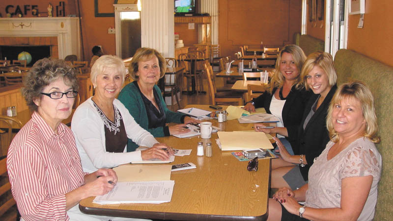 Trumbull County Medical Society is planning a fundraiser for Access Health Mahoning Valley. Involved in the project are, from left to right, Marjorie Dangaron and Carol Olsen, TCMS volunteers; Cheryl D’Amore, AHMV board member; Alyson Scott Spon, executive director of TCMS; Amanda Mesmer, executive director of AHMV; and Molly Halliday, fundraising volunteer.