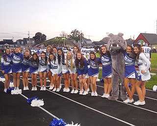 Poland Varsity and Junior Varsity cheerleaders are all smiles after the Bulldogs big win against Struthers