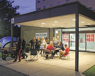 Democrats set up camp outside the Mahoning County Board of Elections on Oak Hill Avenue. Monday night’s sleep-out was designed to raise awareness about early voting in Ohio, which began today.
