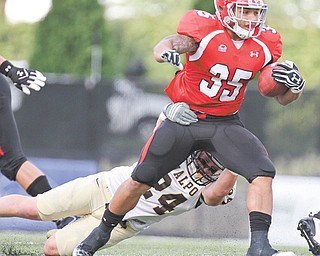 While YSU’s Jamaine Cook (35) admitted he wouldn’t have chosen North Dakota State, he said the school’s success is a credit to its coaches.