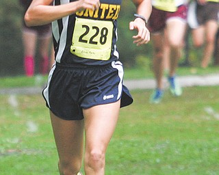 Allison Parks of United leads the pack in the ITCL girls cross country race Tuesday in McDonald. Parks eventually
won the race.