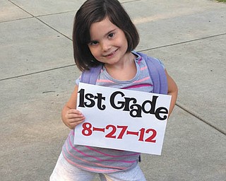 Carley Johnston, 6, of Poland was very excited to pose for pictures on her first day of first grade at Struthers Elementary School. The picture was taken by Carley's mom, Cara Johnston.