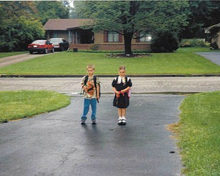 Melissa Pregi sent this picture of her son, Sean, on his first day of second grade and her daughter, Liana, on her first day in kindergarten. The photo was taken in September 2003, when the kids were heading off to West Boulevard in Boardman.