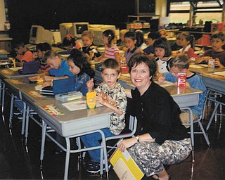 Melissa Pregi sent this picture of her, son, Sean, with his teacher, Mrs. Kinney, on his first day in second grade at West Boulevard in Boardman in September 2003.
