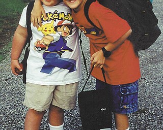 Jimmy (right) and Eric Evans are ready for their first day attending Western Reserve Elementary. Today, now aged 22 and 19 respectively, Jimmy is a second lieutenant in the Air Force stationed at McChord Air Force Base, Tacoma, Wash., and Eric is working for a custom harvesting company in Selden, Kan. Submitted by their mom, Pam Evans of Berlin Center.