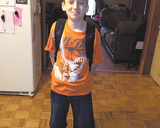 Sabastian, of Niles, is all smiles on his first day at day at The Rich Center.