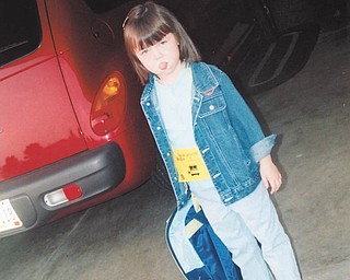 Katrina Wolfe of Columbiana shared this precious moment taken the first day of school for her less-than-enthusiastic daughter KayLee Wolfe Whistler.