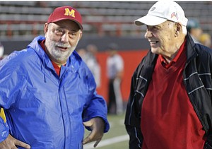 ROBERT K. YOSAY | THE VINDICATOR.." Coach Nard" - Roy Nard- Mooneys coordinator for tickets and playing area - under athletic director and former football Coach Don Bucci ( red and black coat) - will be retiring from phys ed teacher after 42 years - and retired from basketball ( girls) after 30 years in 2003 - . This was before the Cardinal Mooney's game against Clevelands St. Eds. ... - -30-..