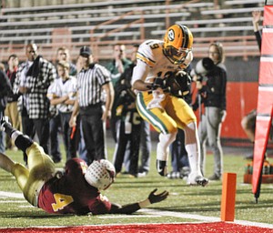 ROBERT K. YOSAY | THE VINDICATOR...Jumping pass Mooneys #4 Marcus McWIlson St Eds #19 Anthony Young- gets the first TD for St Eds...Lakewood St Edwards vs Cardinal Mooney at Stambaugh Stadium at YSU -... - -30-..