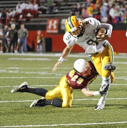 ROBERT K. YOSAY | THE VINDICATOR.. St Ed's #9 ... Ryan Fallon .. breaks away from Mooneys #29 Joe Kleeh as he heads for a first down and almost a TD during Second quarter action at Mooney -..Lakewood St Edwards vs Cardinal Mooney at Stambaugh Stadium at YSU -... - -30-..