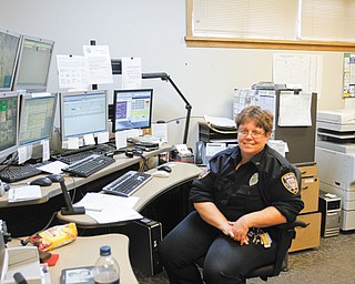 Kim Stolic of Hubbard has worked as Hubbard city 911 dispatcher for 20 years. She will be the last dispatcher on duty when the city’s emergency-call services are transferred to the Trumbull County 911 Center on Thursday morning.