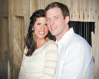 Kira A. Sanders and Ty Henkaline